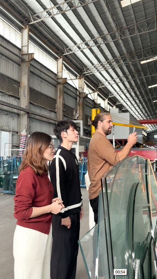 Production line inspection with client at BDGLASS facility